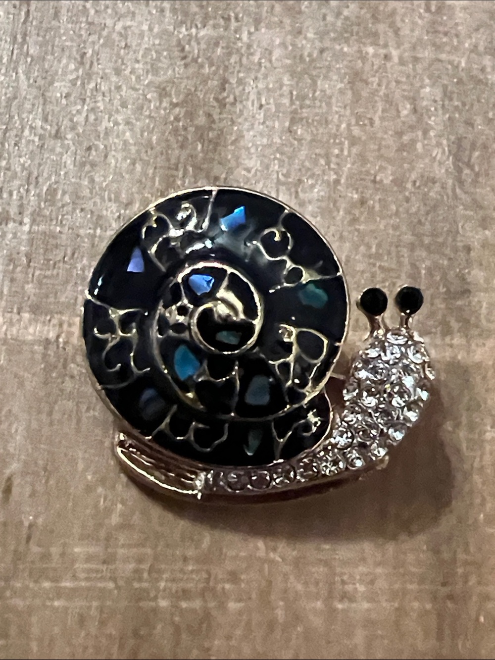 3/$18 Gold-Tone Snail Brooch with Black and Iridescent Shell Lot 411